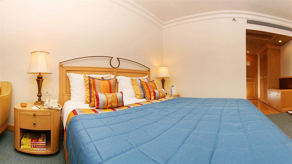 兰花酒店 孟买 外观 照片 A bedroom at the hotel