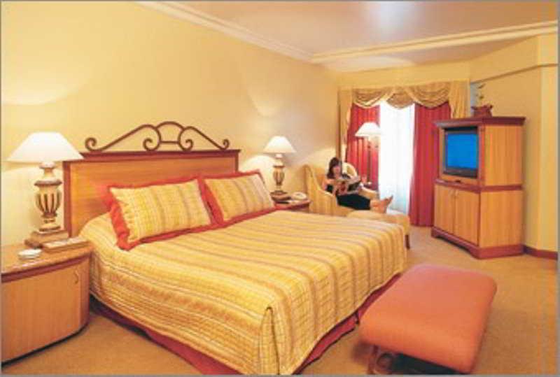 兰花酒店 孟买 客房 照片 A bedroom at the hotel